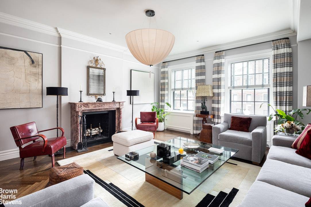 Comprising the entire top full floor, this newly renovated four bedroom plus library apartment combines contemporary amenities in a traditional prewar layout that honors the legacy of the buildings original ...