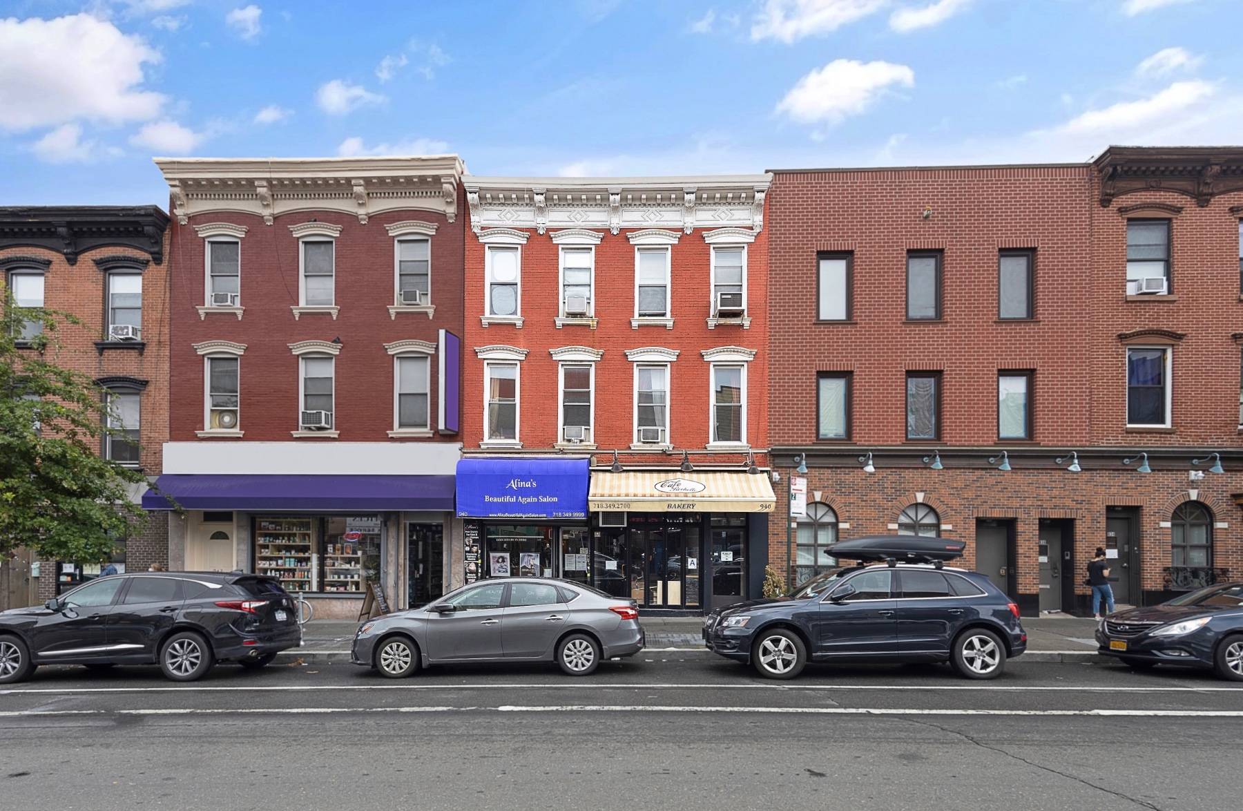 Three level income producing, mixed use brownstone, situated on a 25x100 feet lot with commercial buildouts and additional buidable air rights.