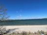 Property view of water featuring a beach view