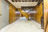 Finished basement with wood walls