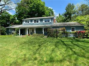 Well located spacious colonial on a 1 acre quiet private lot at the end of a private road in the Compo Beach area across from Longshore Club.