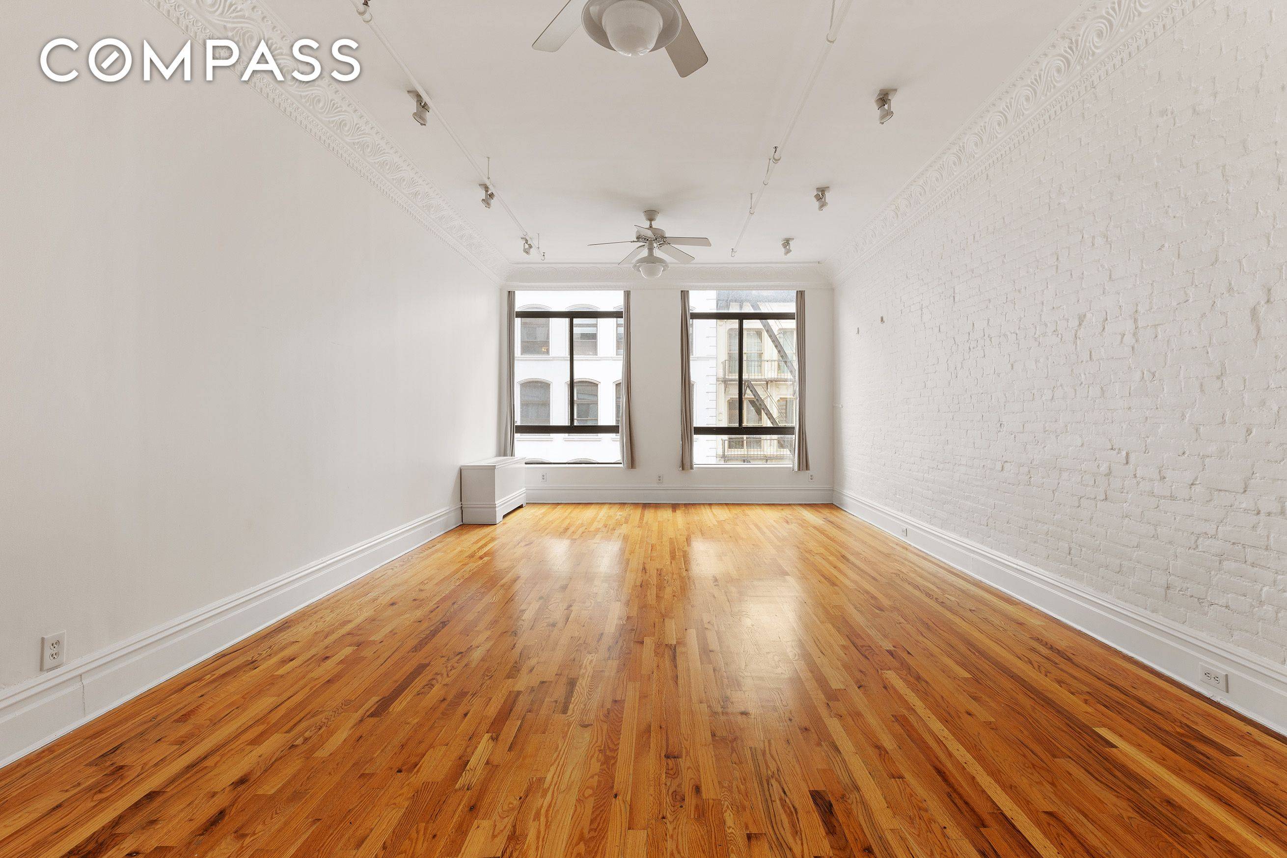 Welcome to this exquisite 2 bedroom, 2 bath loft nestled on a charming block in Tribeca.