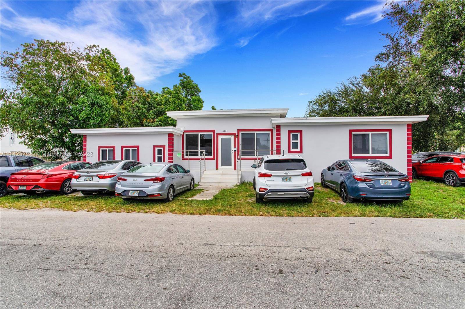 This spacious MiMo house has been designated a Commercial space and is centrally located one block from NE 2nd Ave with lots of parking spaces.