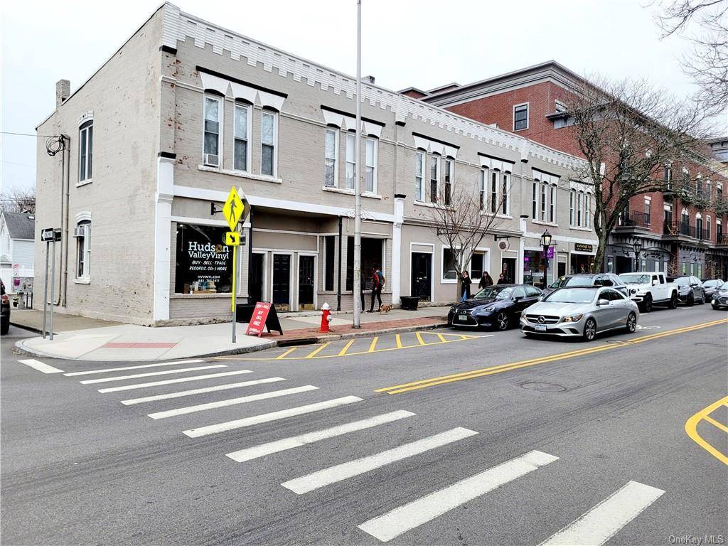 This grand 12 unit brick building located on Main Street in downtown Beacon offers a prime investment opportunity with its mix of residential and commercial units.