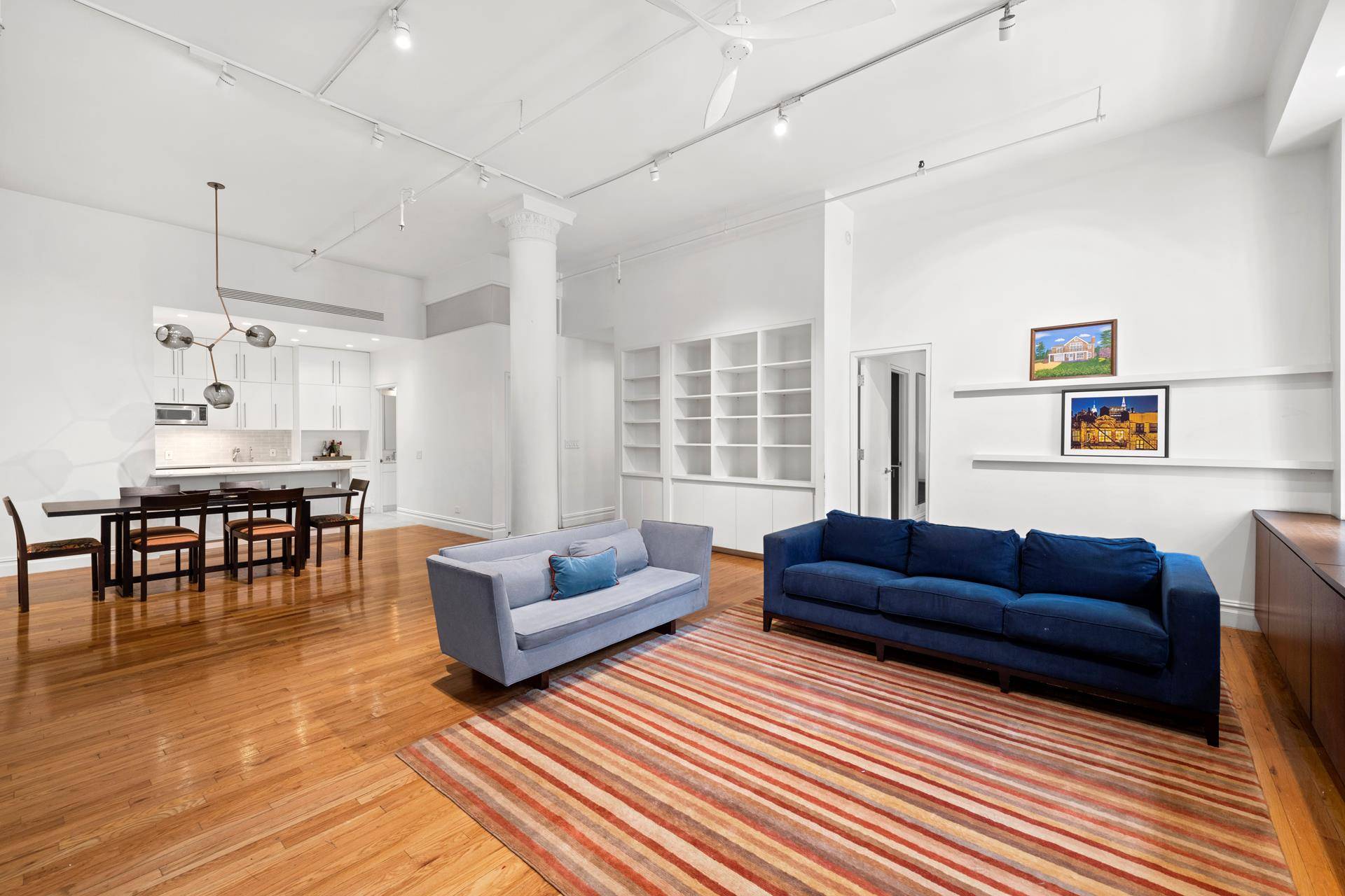 Renovated, spacious, two bedroom, two bathroom loft, plus home office, in the heart of Flatiron, featuring 12 foot ceilings and oversized windows.