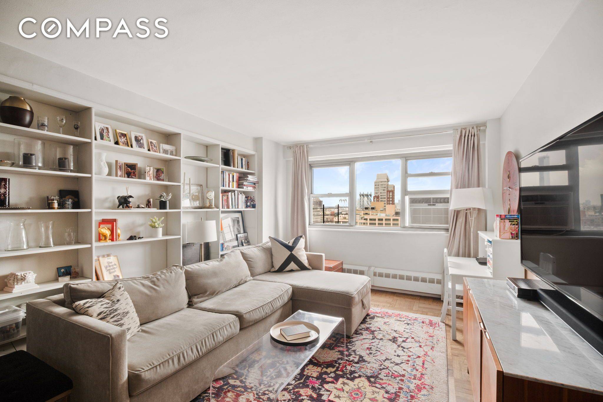 Welcome home to your high floor renovated corner two bedroom two bathroom apartment with amazing views of the Manhattan Bridge, East River and Manhattan !