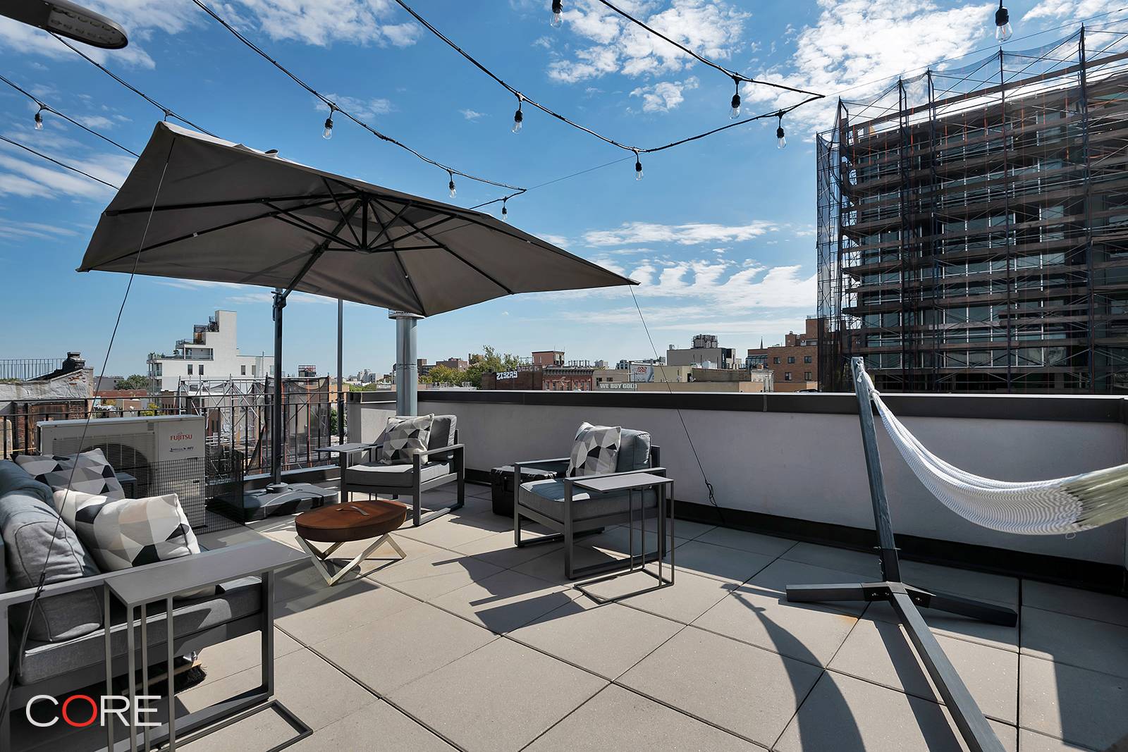 This stunning penthouse duplex features a tremendous private terrace and unobstructed views for days.