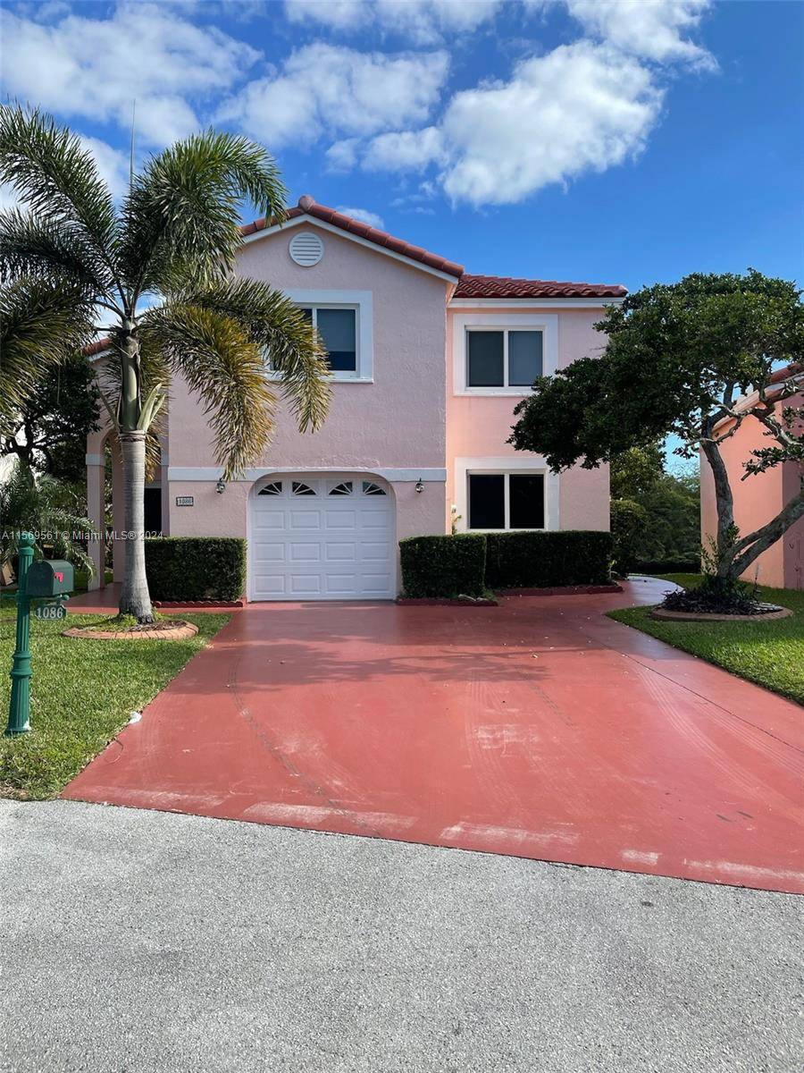 Beautiful, two story, lakefront, property located in Dania Beach !