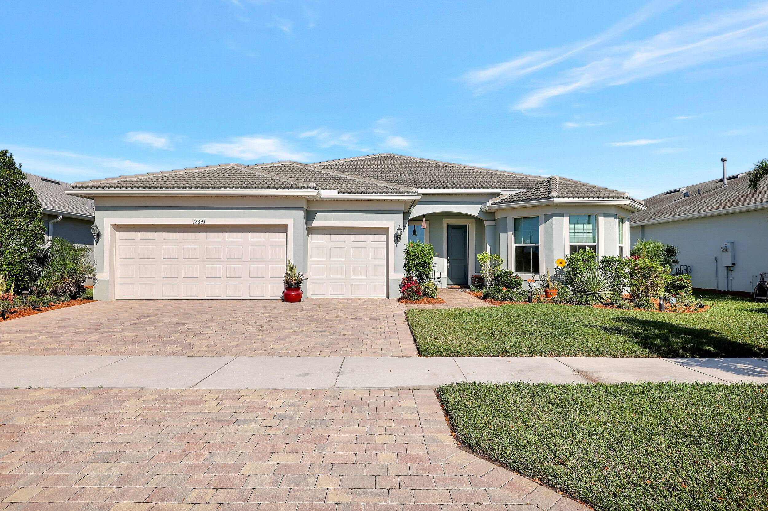 Welcome to the epitome of vibrant 55 living at Del Webb in the heart of Tradition, Port Saint Lucie.