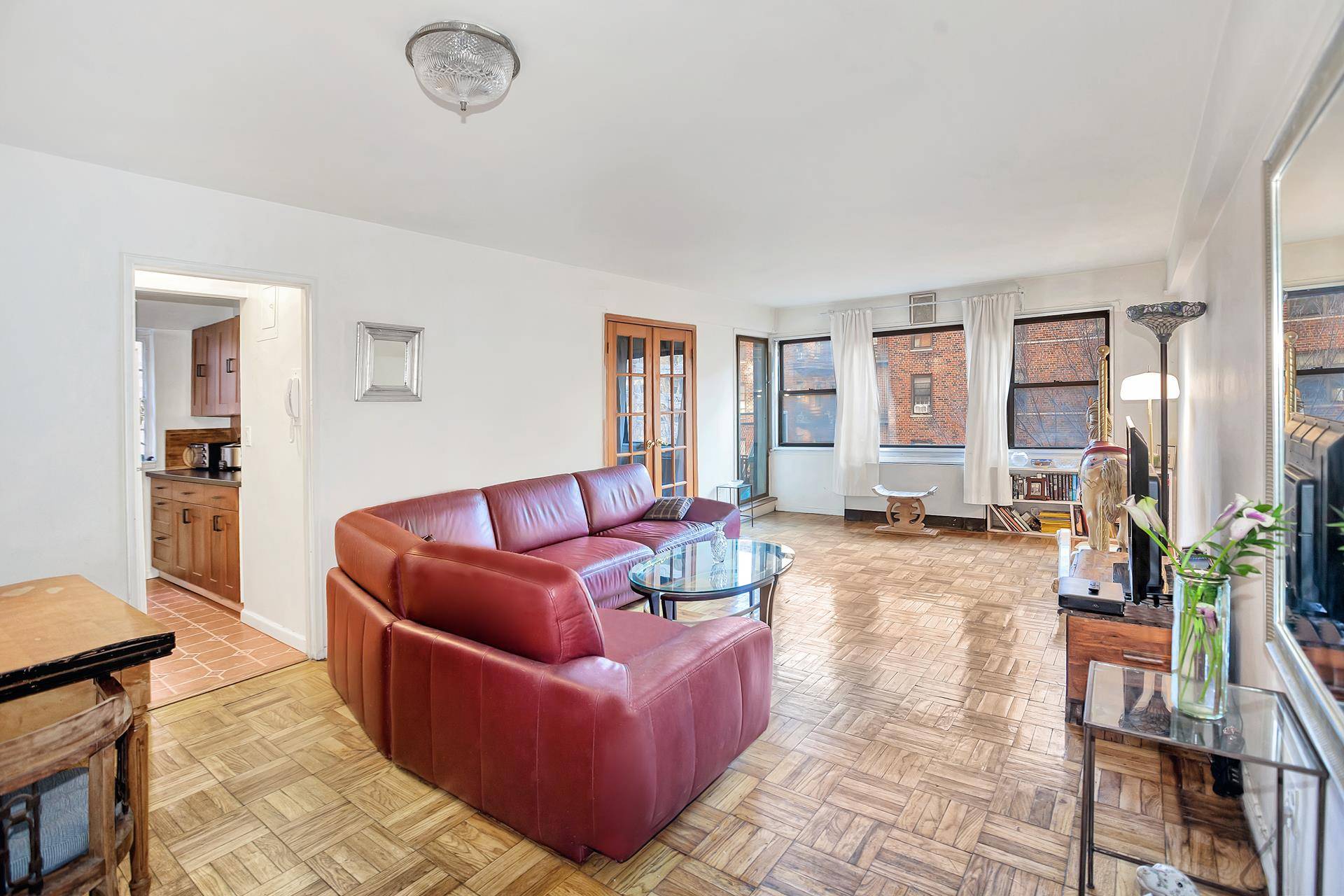 Rarely available corner unit with double exposure and terrace in the heart of Greenwich Village !