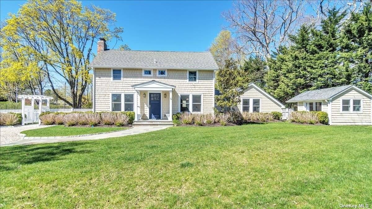 Beautifully Renovated and Tasteful 1930's Farmhouse situated in one of the most ideal locations in the Village of Westhampton Beach !