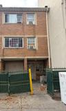 View of front of property featuring brick siding