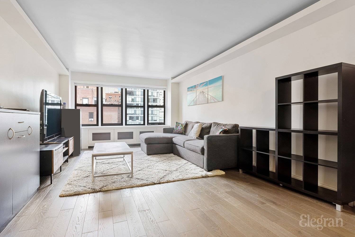 This light filled, spacious and updated apartment is set high within this sought after building in a quiet offset of Third Avenue.