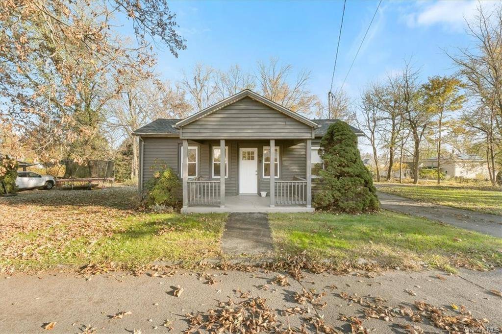 This charming cottage style home is conveniently located within a short walk to Uptown Kingston.
