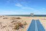 Property view of water featuring a beach view