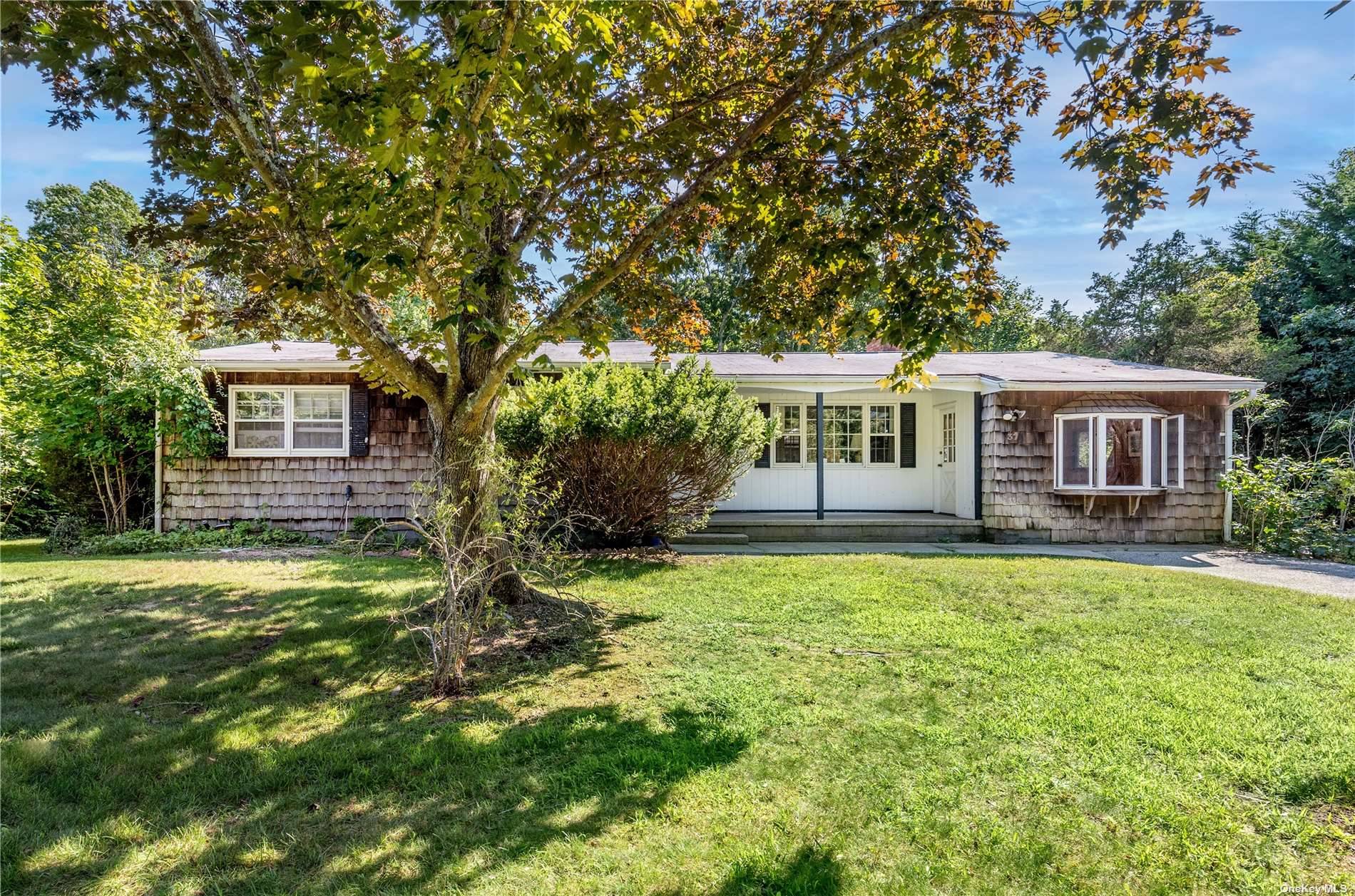 Make this East Quogue ranch your next home.