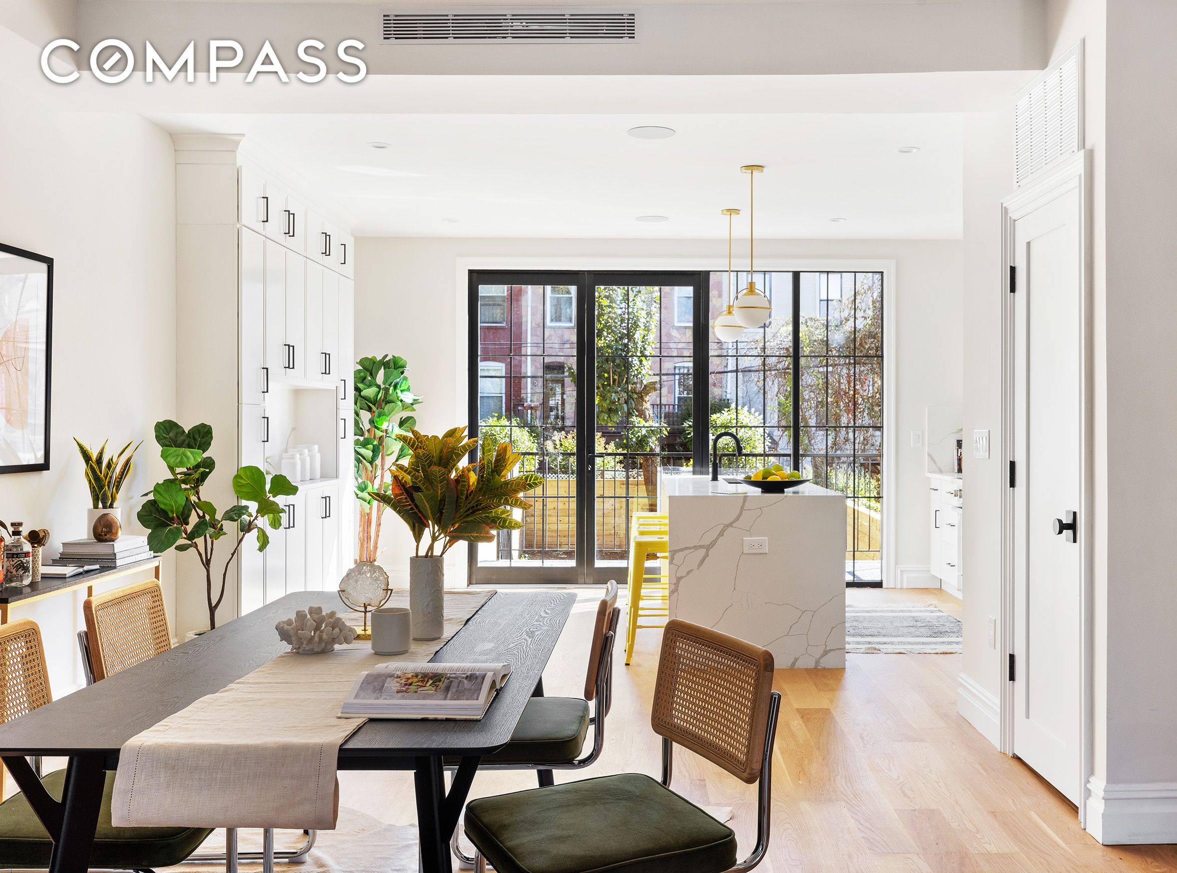 116 Cooper Street is a newly renovated two family townhouse that features five bedrooms, three bathrooms, two powder rooms, and a finished basement.