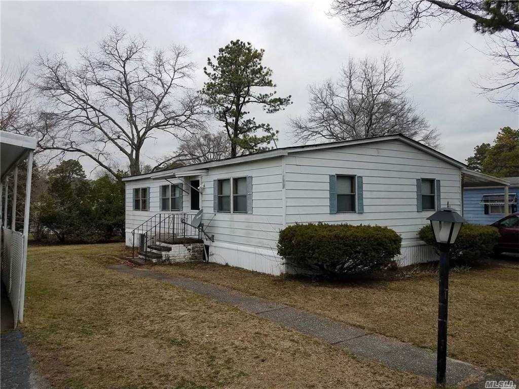 Very Nice Double wide Mobile Home w Carport and Ramp.