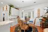 Breakfast nook with bay window, laundry off of kitchen