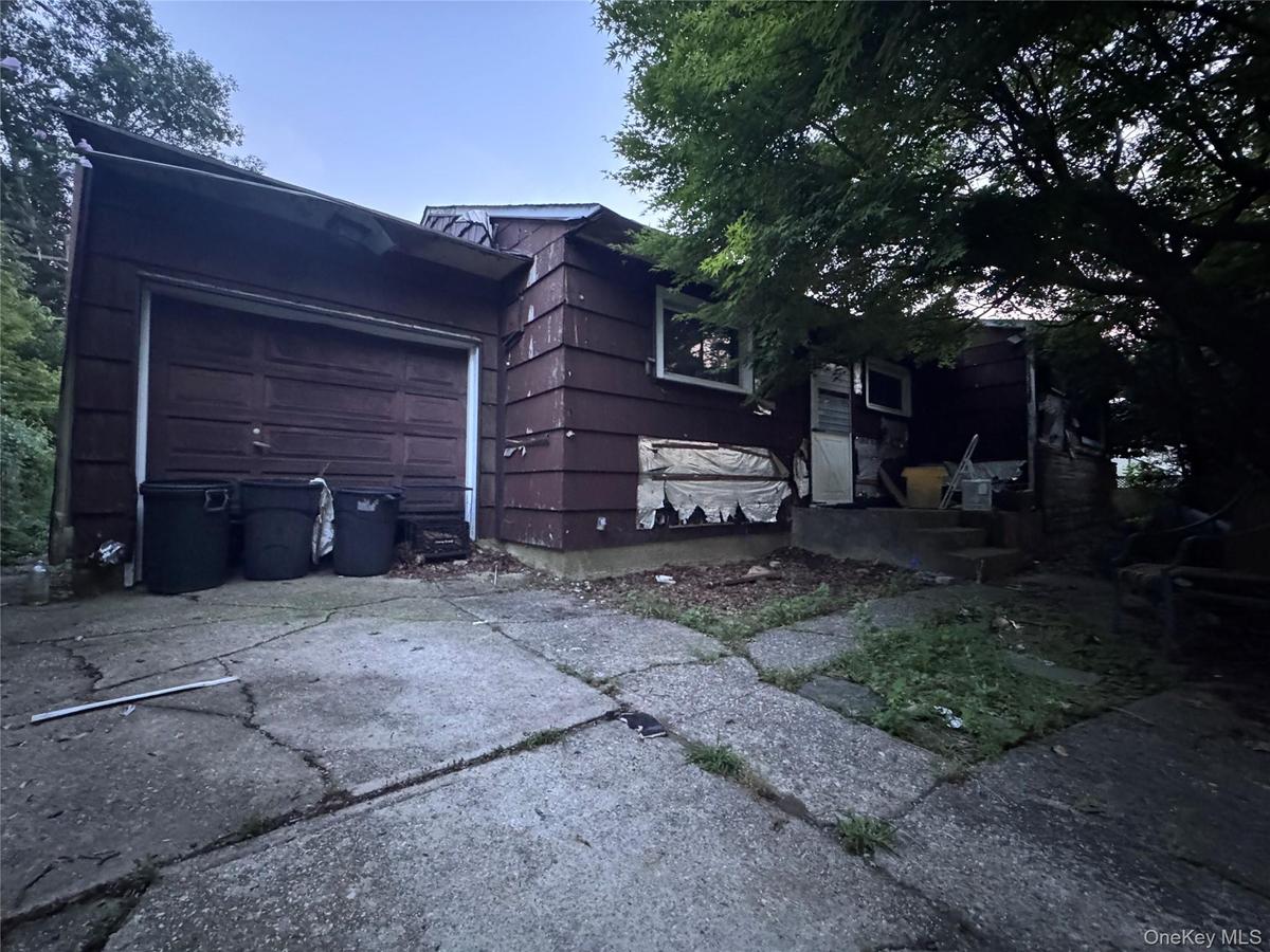 Current use of this almost 10,000 sf lot is a ranch in disrepair