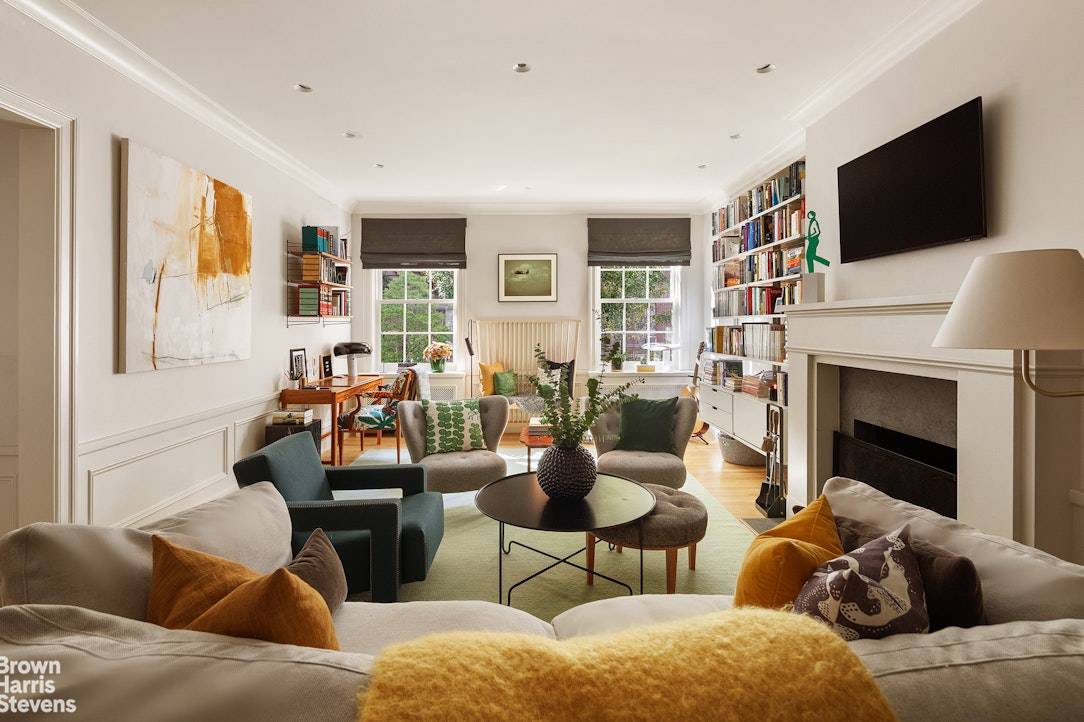 The epitome of elevated simplicity, this meticulously renovated eight room residence balances timeless prewar grace with modern sophistication.