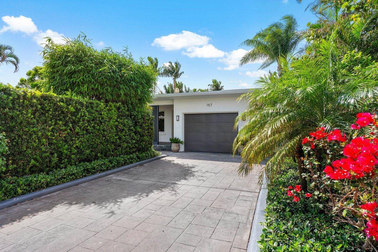 Step into tranquility with this exquisite mid century modern in the heart of Lake Worth Beach.