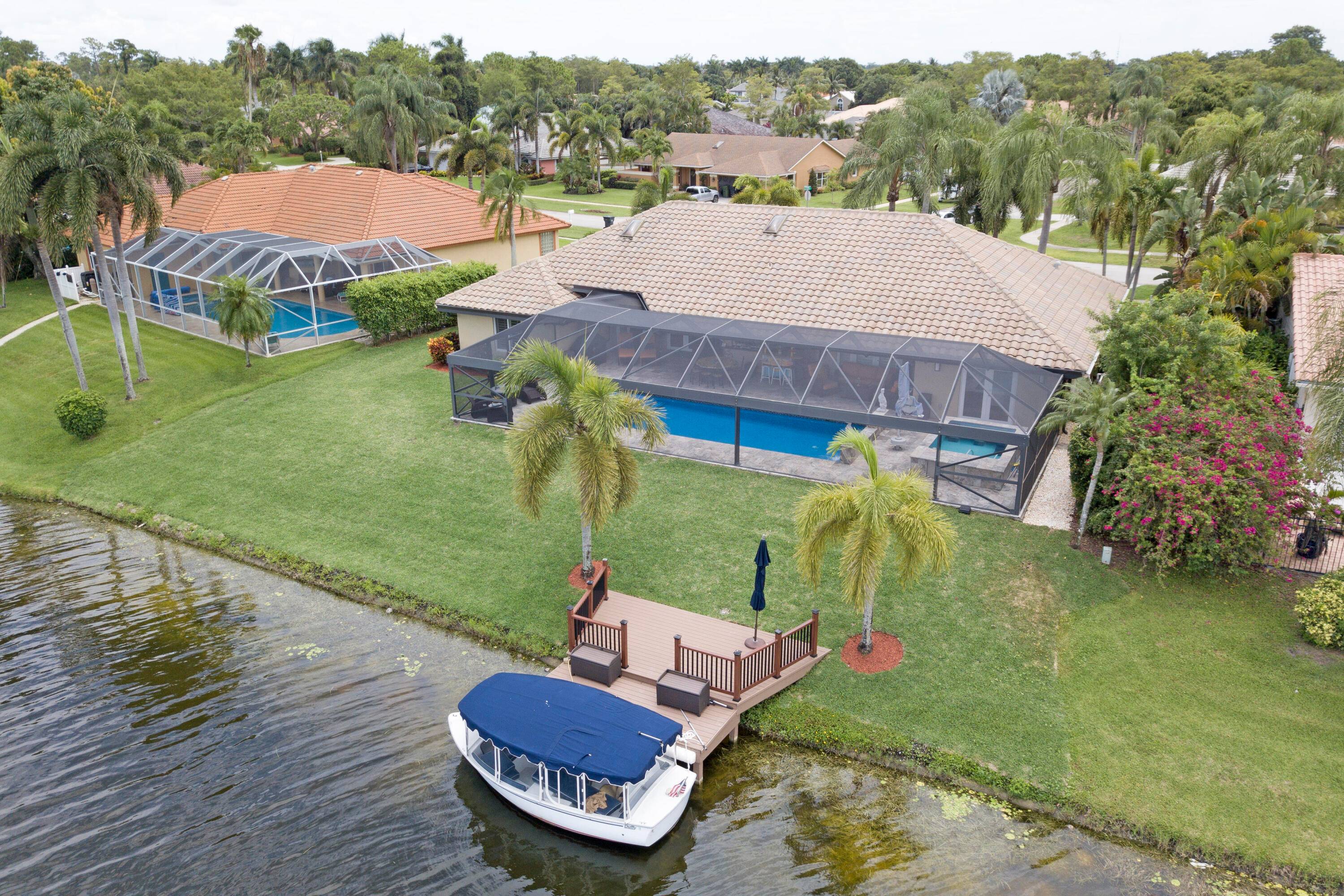 Gorgeous Lakefront large single family pool home available in the desired community of Greenview Shores of Wellington.