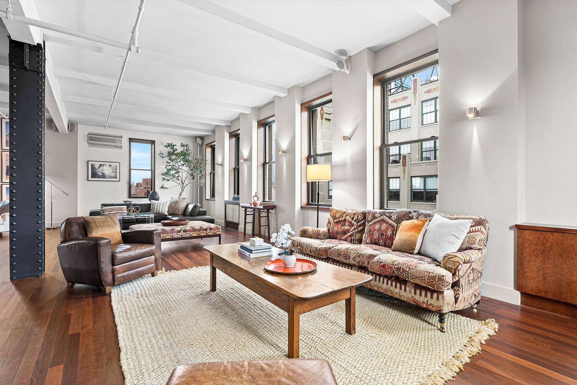 Spectacular full floor loft with four exposures and four bedrooms in the heart of Flatiron !