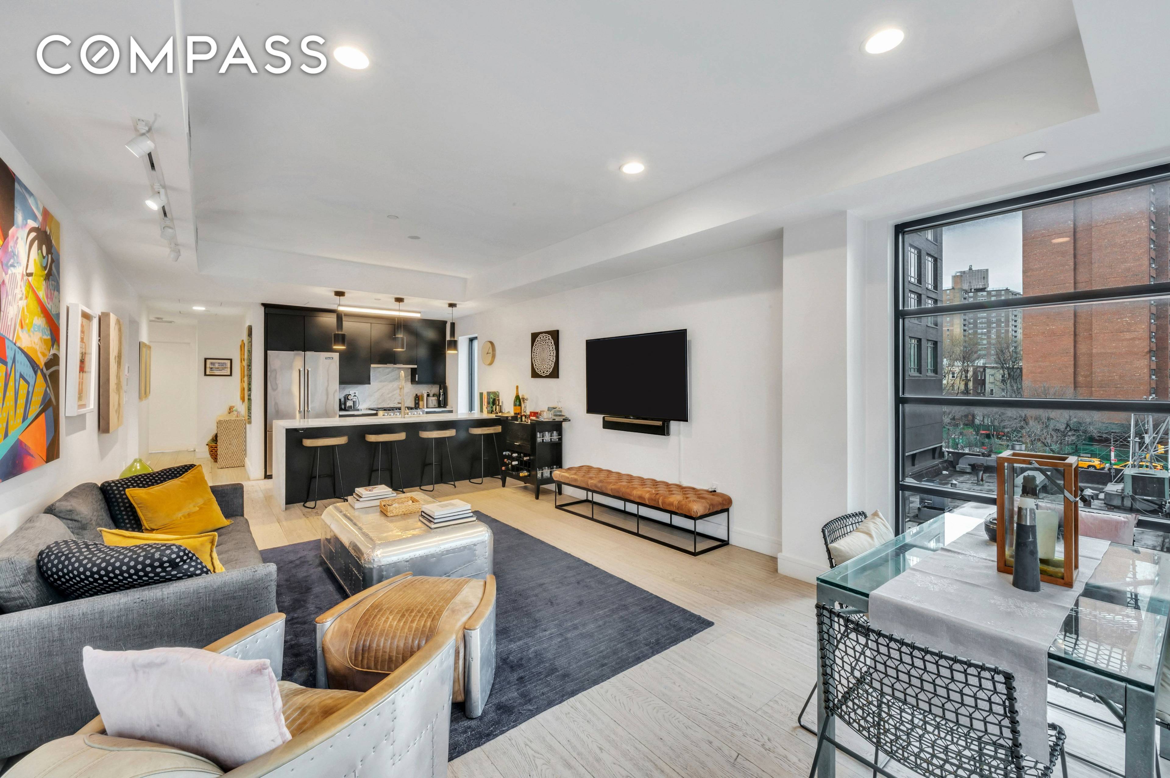 Enjoy the privacy and luxury of this full floor two bed, two bath apartment in the heart of the Lower East Side with E W and N exposures.