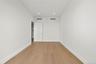 Spare room featuring light wood-type flooring and recessed lighting
