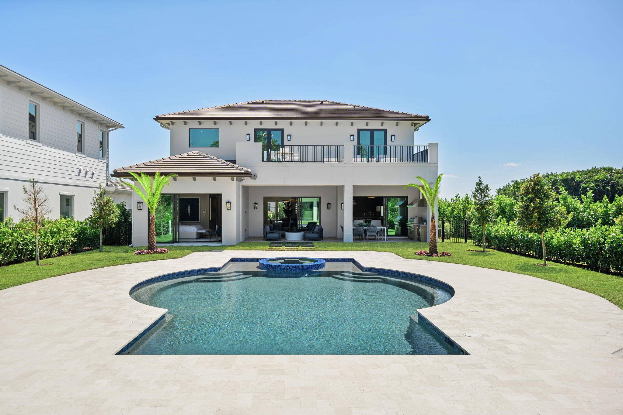 Discover the epitome of luxury living in this stunning new construction home on an over 17, 000 SF lot nestled within the prestigious Palm Beach Polo Club.