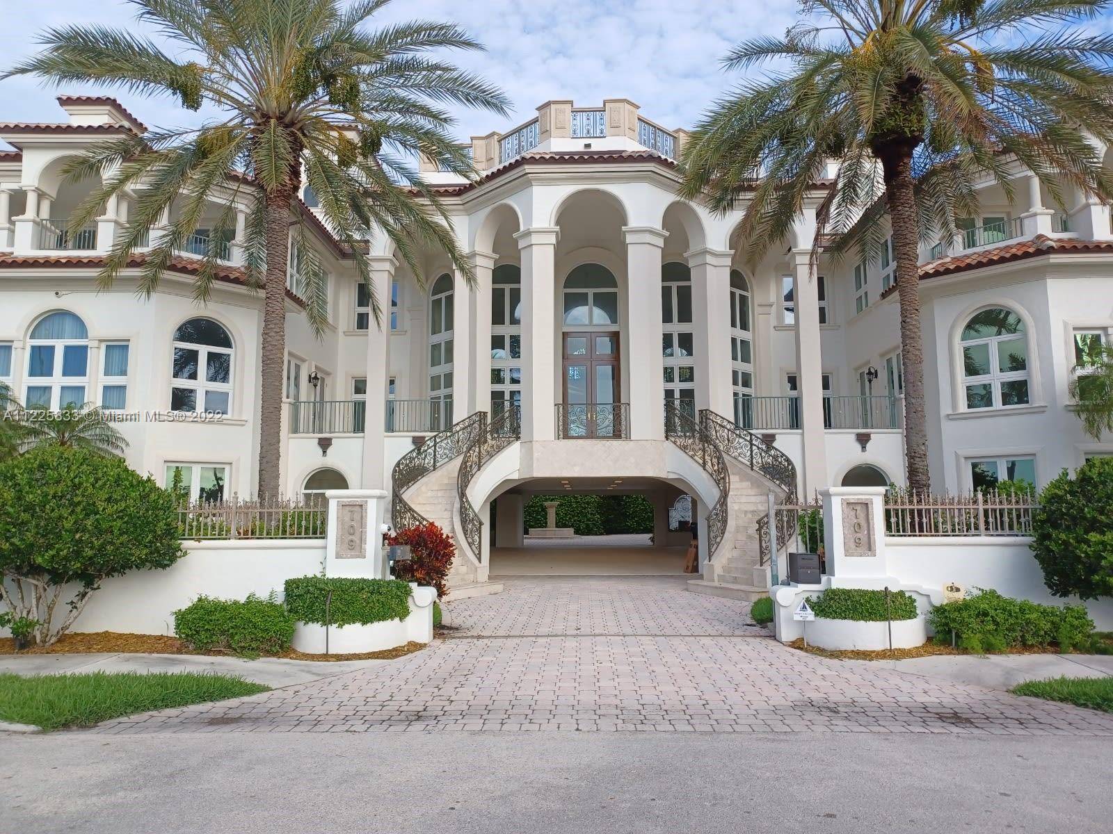 Indulge in this lavish 9 bedroom waterfront mansion, 9 bedrooms with Living room, boasting floor to ceiling windows.
