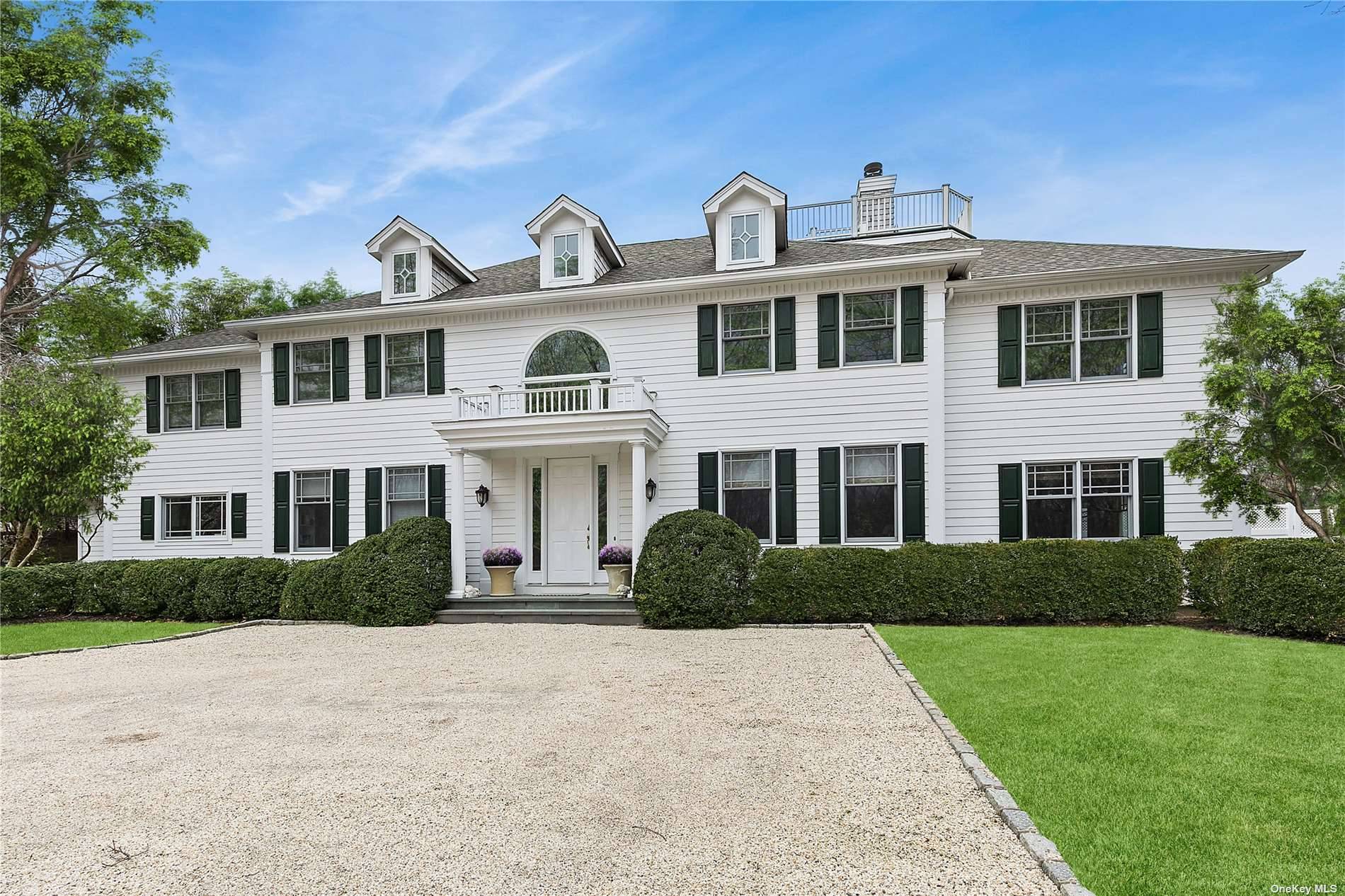 Secluded, Elegant, Private Drive up a landscape lit 350 foot Belgian block curbed driveway to this elegant 5, 250 sf, 6 bed 6.