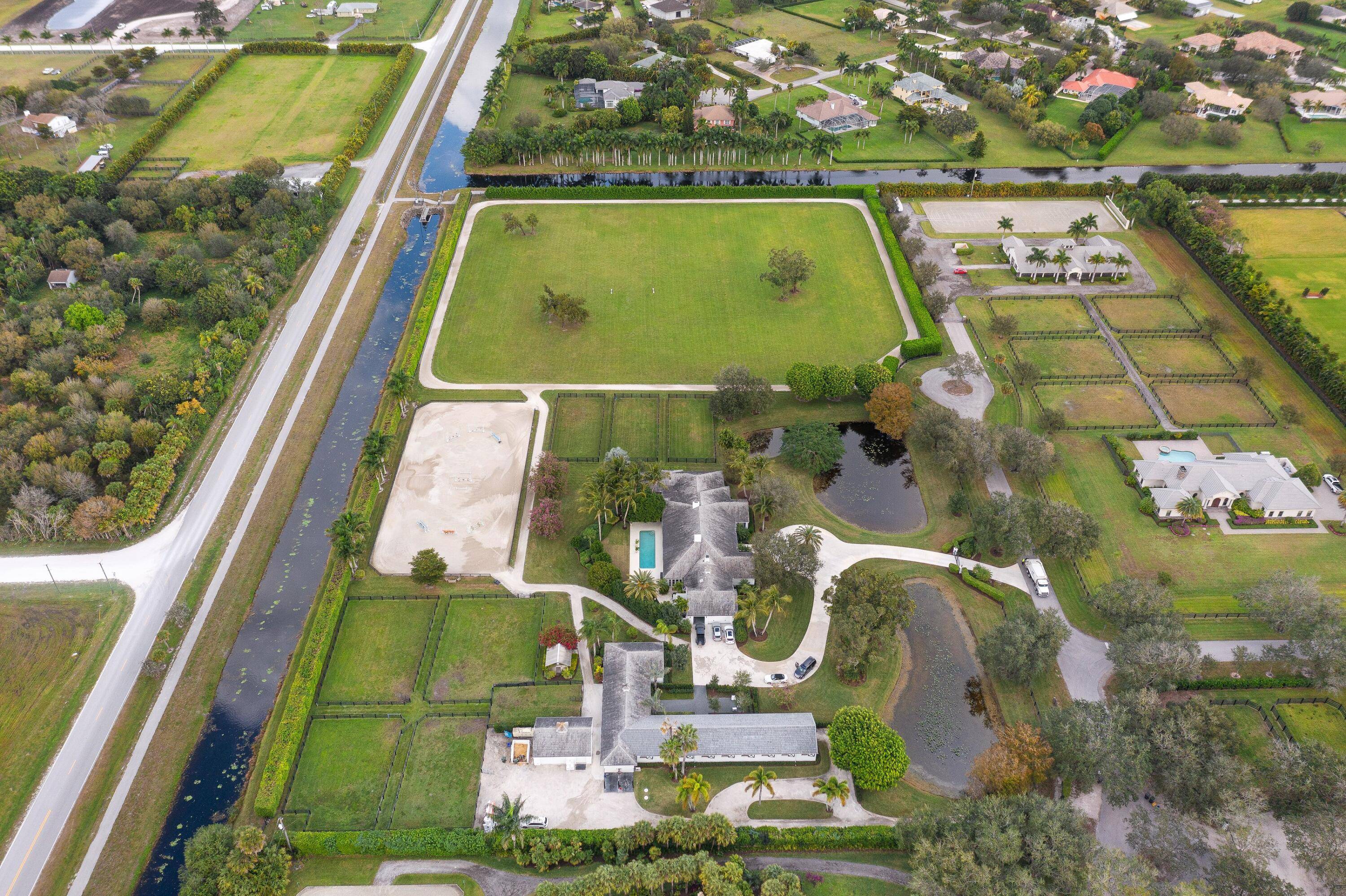 Magnificent 10 acre farm on the most private prestigious street in Palm Beach Point.