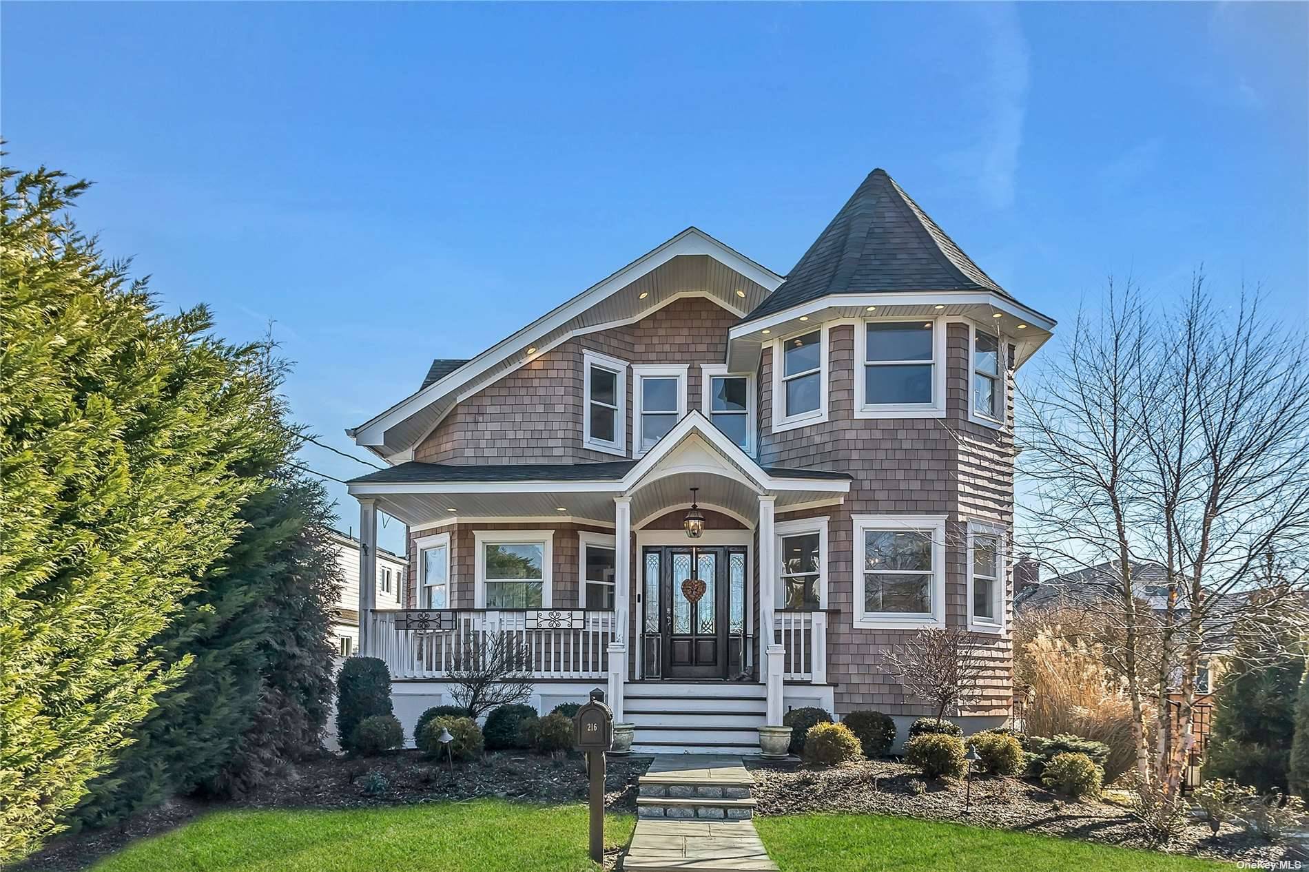 The Hamptons meets Amityville in this spectacular and unique fully renovated waterfront home.