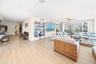 2 way mirror in the living room allows the views to carry through to the kitchen
