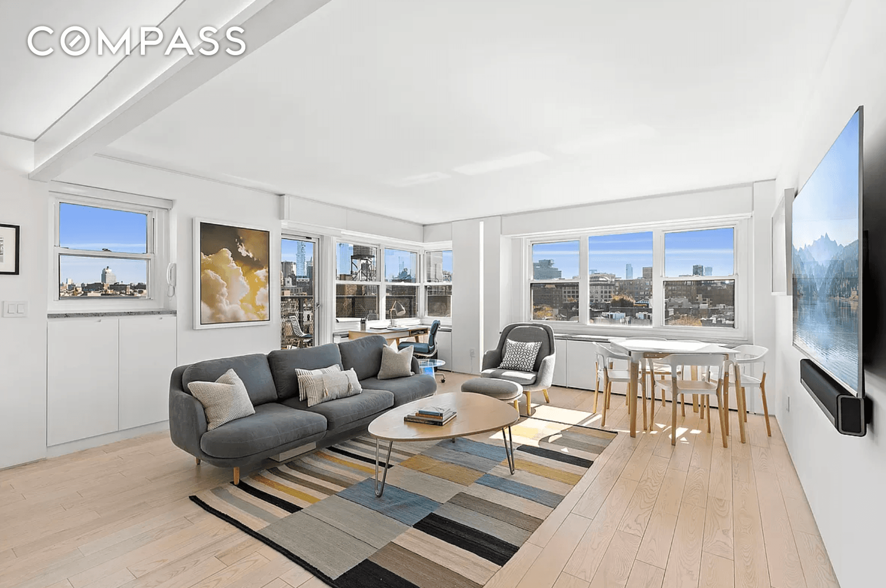 A fully renovated corner one bedroom with a private terrace, beautiful light, and panoramic views in the heart of the West Village.
