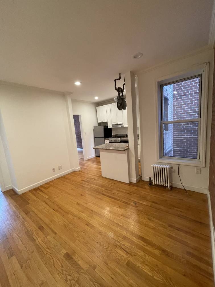 Actual PhotosBeautiful, bright, renovated 2 Bed, 1 Bath Apartment 5th Floor106 Norfolk Street is a prewar rental building with high ceilings, charming molding, large windows and exposed brick.