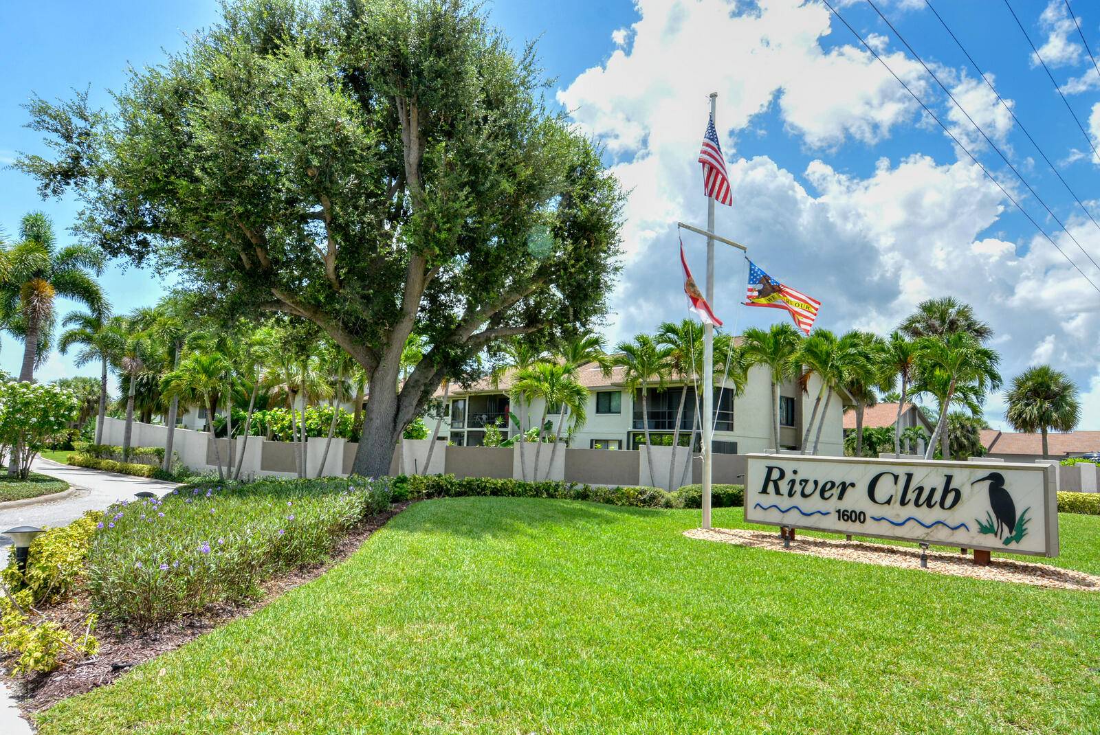 GROUND FLOOR CONDO IN NO AGE RESTRICTED WATERFRONT COMMUNITY WITH RESORT STYLE AMENITIES !