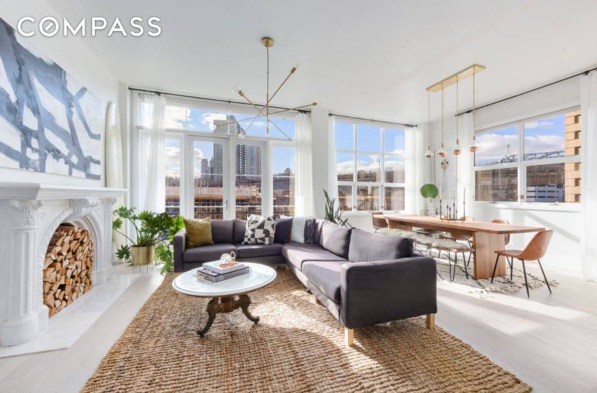 Chic designer style and extraordinary sunlight fill every inch of this recently renovated convertible three bedroom, two bathroom condo in ultra desirable Dumbo.