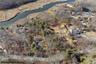 Aerial overview of property's location featuring property boundaries highlighted and a large body of water