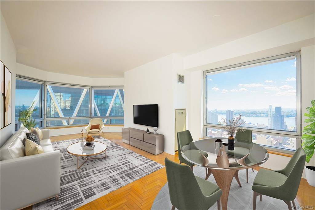 Hi Floor Luxury Condominium Apartment boasts Bay Windows with Spectacular Panoramic City Views on the Southeast and South, and both City and River Views on the Southwest and West to ...
