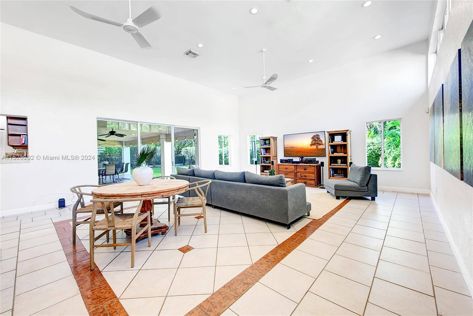 Raise your family in a spacious, fabulous Spanish Colonial 5, 200 sqft gated Brickell Hammock home 2 blks from the ocean at the entrance to Brickell, Key Biscayne Coco Grove.