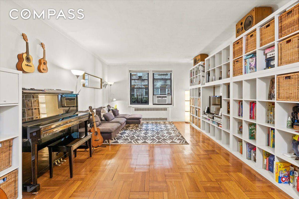 This beautifully renovated one bedroom plus office den bedroom, one bathroom home dazzles with crisp, clean finishes and garden views in a fantastic Prospect Park South Ditmas Park cooperative.