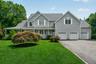 Welcome to 8 Angela Court, an exquisite Colonial home nestled on a private cul-de-sac!