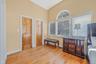 Sitting room featuring light wood finished floors and baseboards