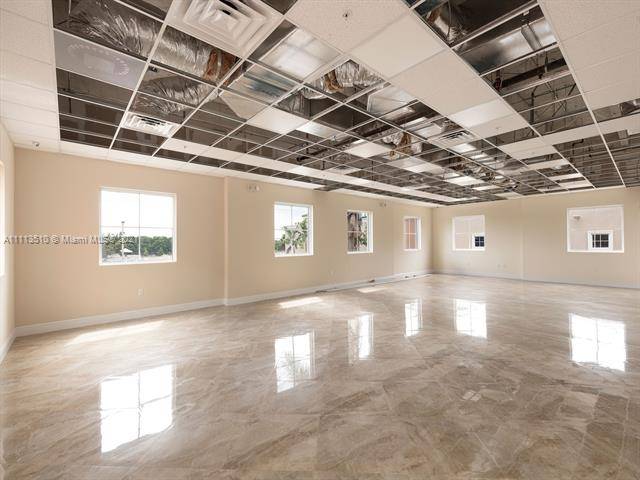 Two Class A, Gold Certified office buildings for sale in South Dade.