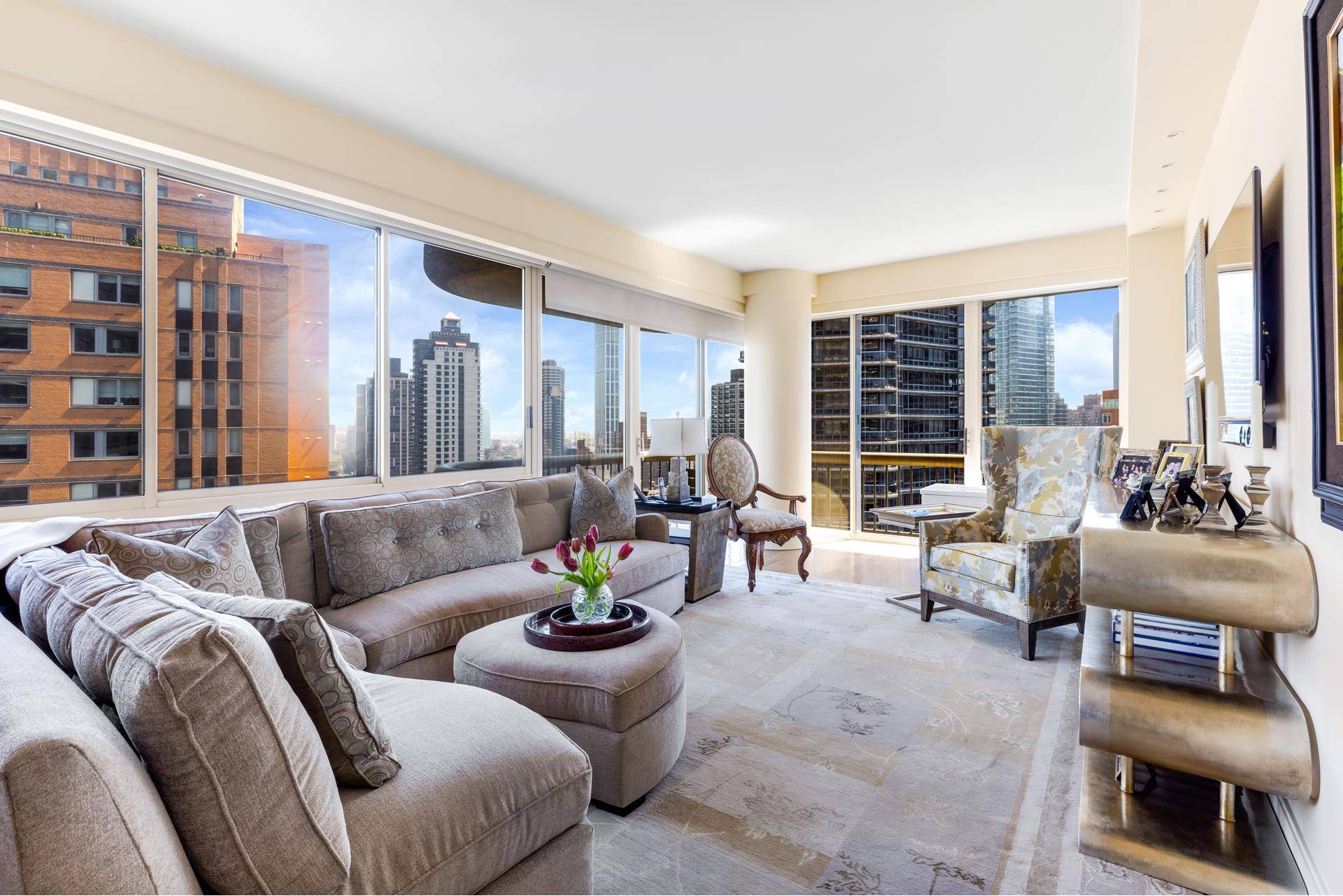 Resting high on the 28th floor of a sought after luxury cooperative in prime Lenox Hill, stunning 28A is truly awe inspiring with its amazing views, wraparound private balcony and ...