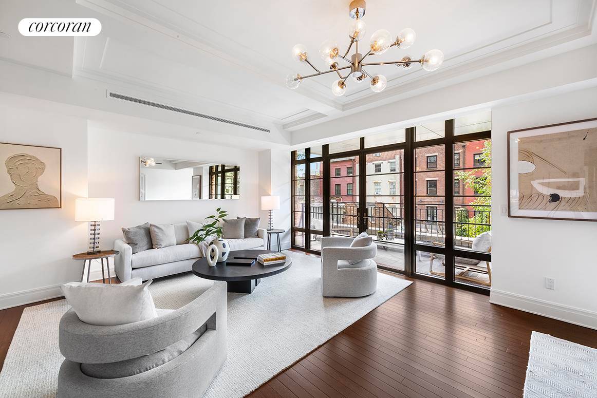 Situated mid block on one of the Village's prettiest tree lined townhouse blocks, west 12th street, this expansive and elegant interpretation of a classic prewar three bedroom residence spans 2, ...