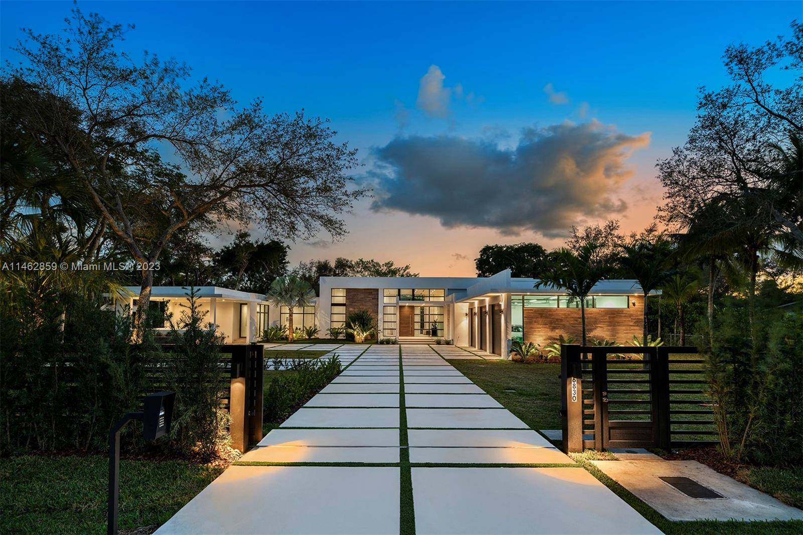 Luxury living awaits in this stunning 2022 modern estate in Pinecrest offering state of the art construction and impeccable finishes.